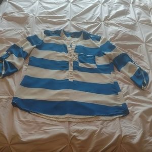 Soft half button up blouse.